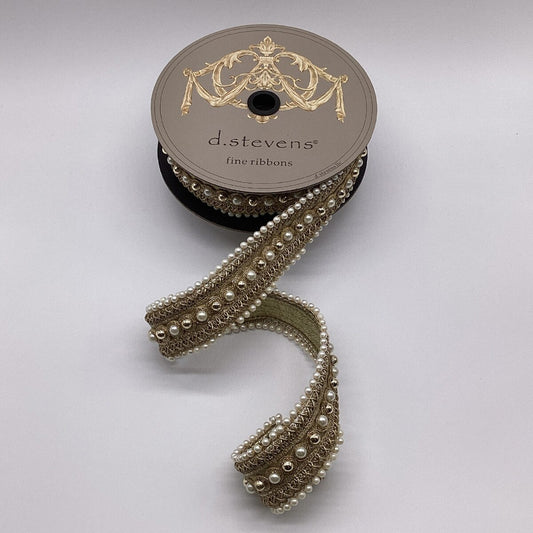 Spool of decorative ribbon with pearl embellishments on a white background, branded 'd.stevens'.