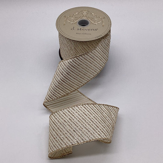 Spool of beige ribbon with a decorative label on a light gray background