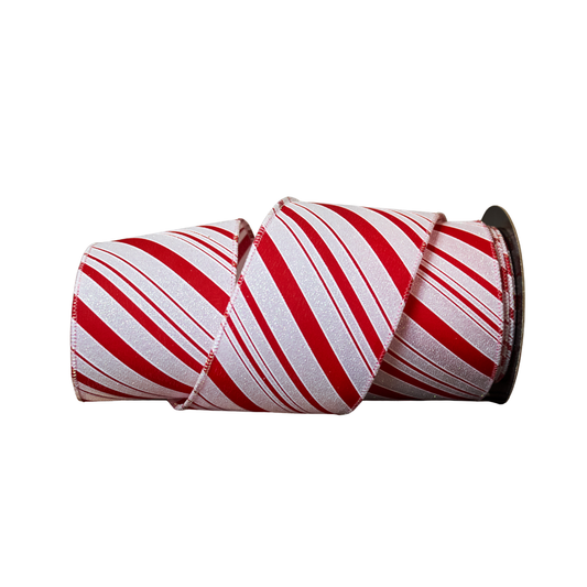 Spool of red and white striped ribbon on a white background