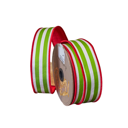 Spool of red, green, and white striped ribbon on a white background