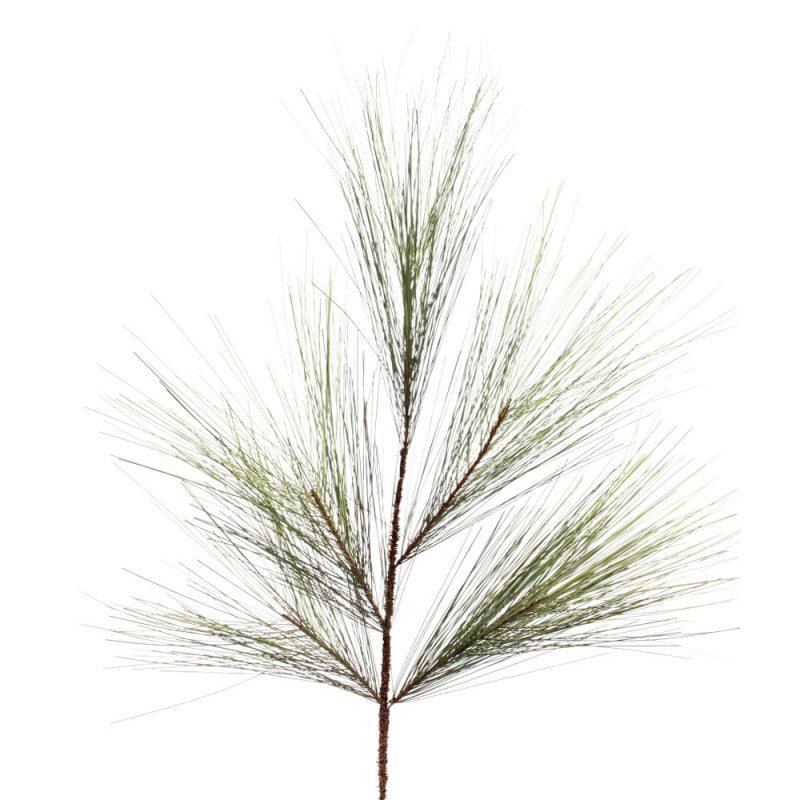 Artificial pine branch on a white background
