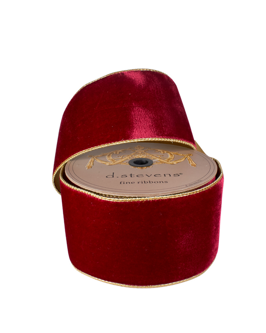 Red velvet ribbon with a visible brand label on a white background