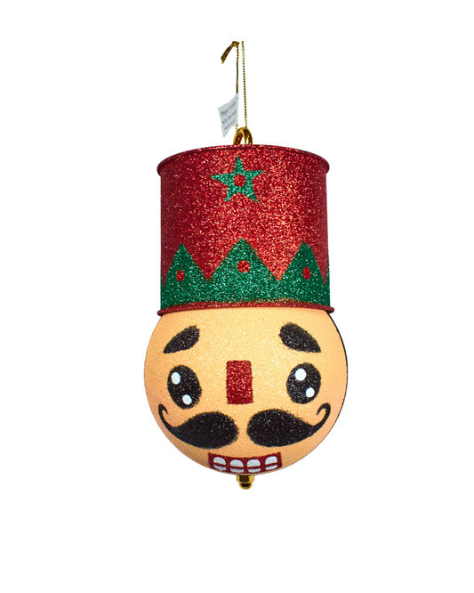 glitter nutcrack ornament on a white background