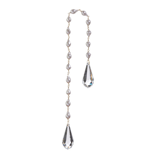 Garland pearl beads and crystal teardrop pendants on a white background