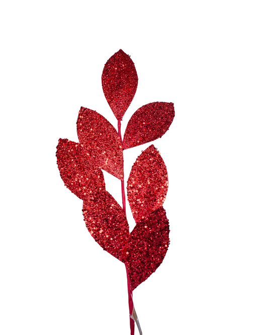 Red glittery leaf branch on a white background