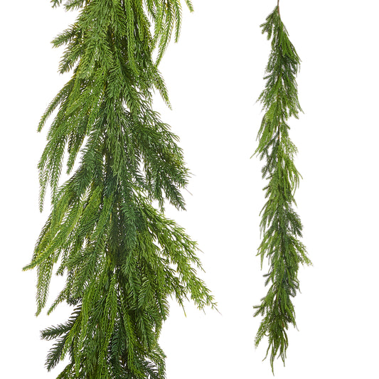 Two artificial green garlands on a white background