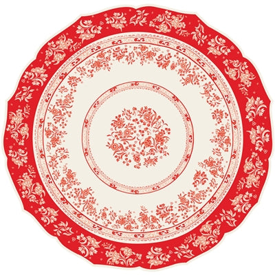 Decorative placemat with red floral pattern on a white background