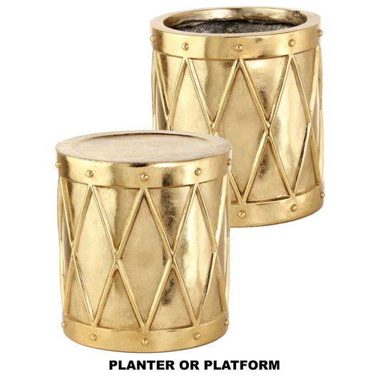 Two gold metal planters drums with geometric patterns on a white background.
