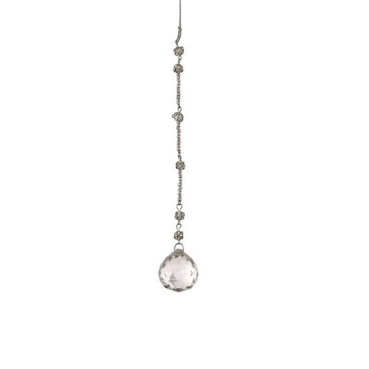 Round drop ornament with a large crystal pendant on a white background