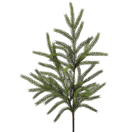 Artificial pine tree branch on a white background
