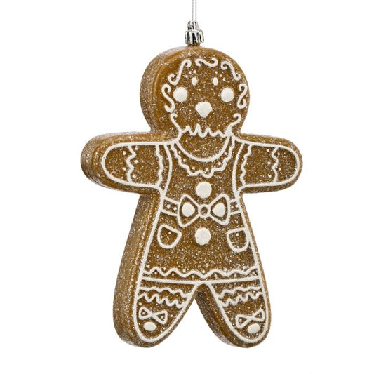 Decorative gingerbread man ornament with gold glitter on a white background