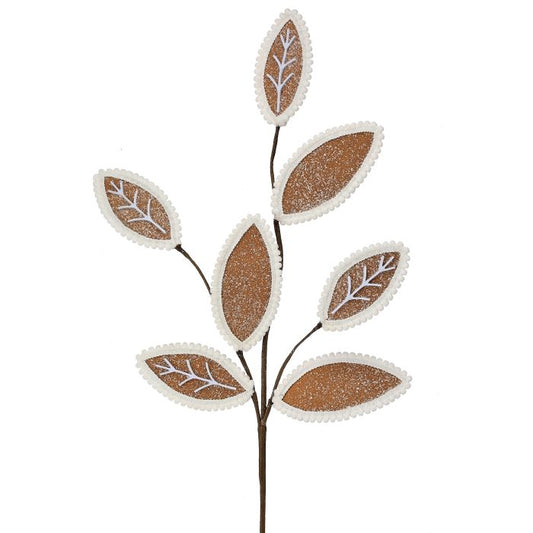 Decorative leaf branch with glittery leaves on a white background