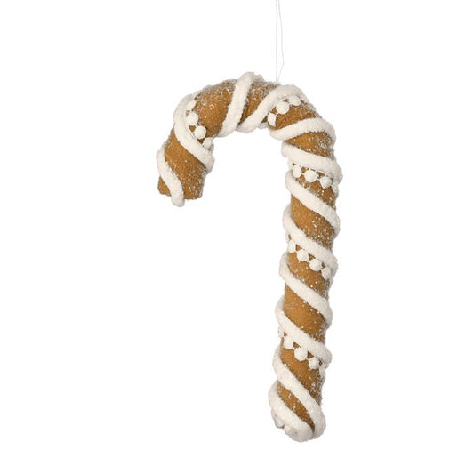 Decorative candy cane ornament with white icing on a white background