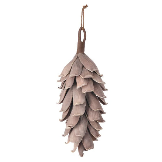 Decorative foam pine cone ornament on a white background
