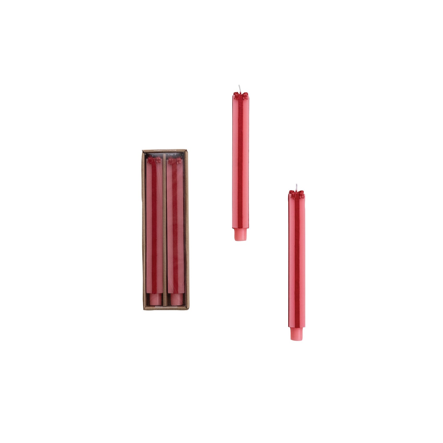 Red candles with packaging on a white background