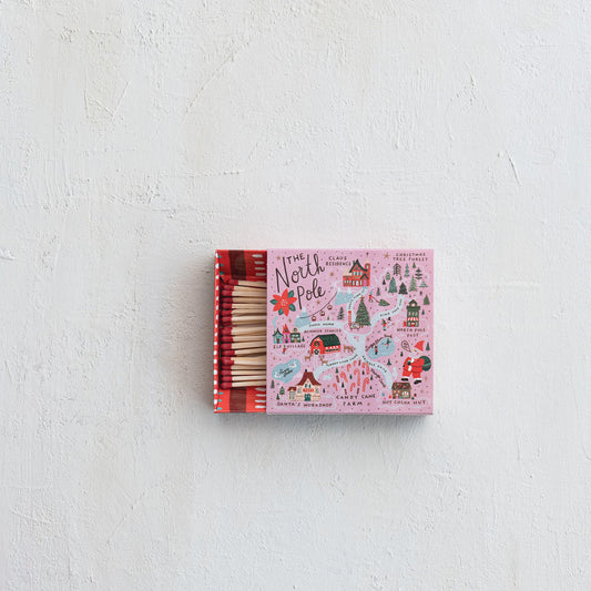 Matchbox with North Pole design on a white background