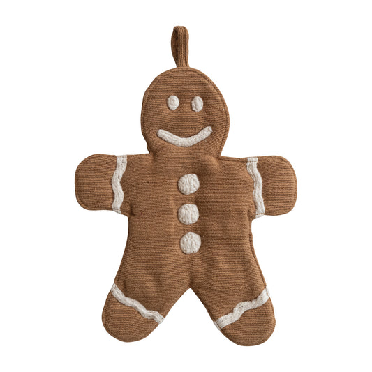 Knitted gingerbread man pot holder 
on a white background