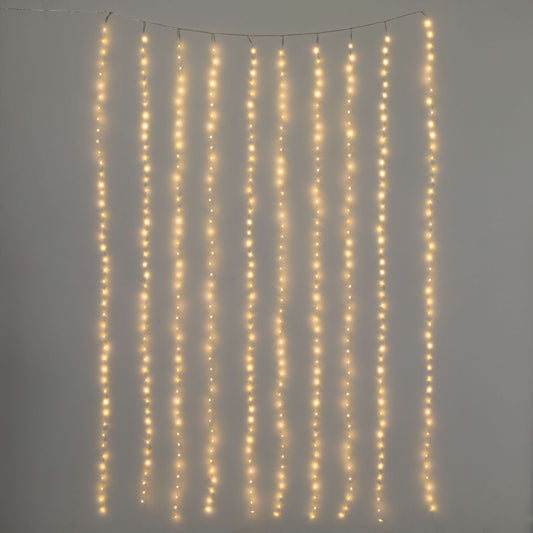 A string of LED lights designed to be hung as a curtain, displaying a row of small, bright lights.