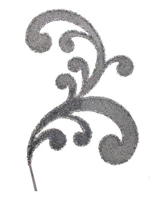 A decorative metal stem with a glittery finish in a swirl pattern, resembling an acanthus leaf.