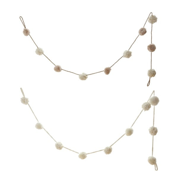 Cream and white pom pom garland. 96 inches long.