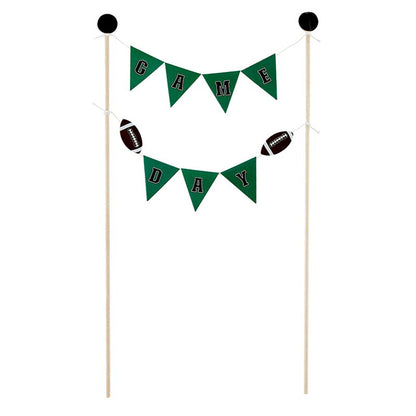 Decorative banner with 'Game Day' text and footballs on sticks against a white background