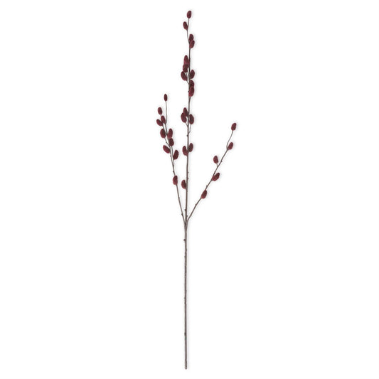 Artificial plant stem with red berries on a white background