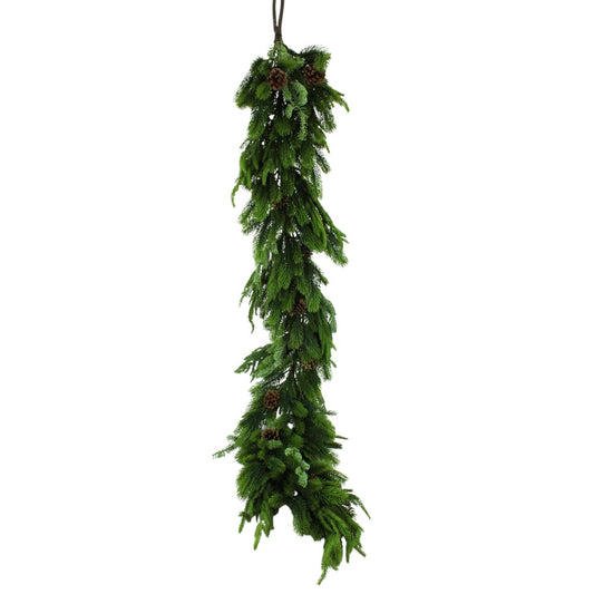 Green artificial garland with pinecones on a white background