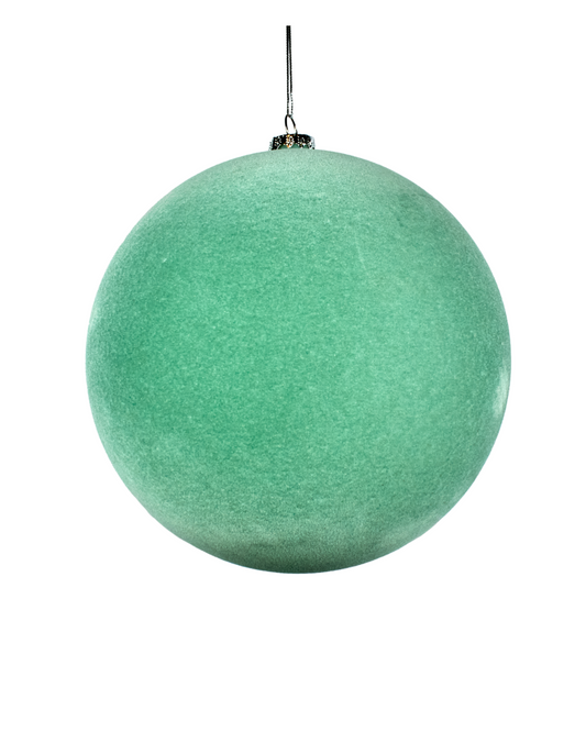 Green Christmas ball ornament on a white background