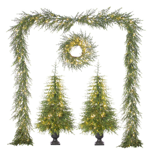 Set of Christmas decorations including garlands, wreaths, and trees with lights on a white background.