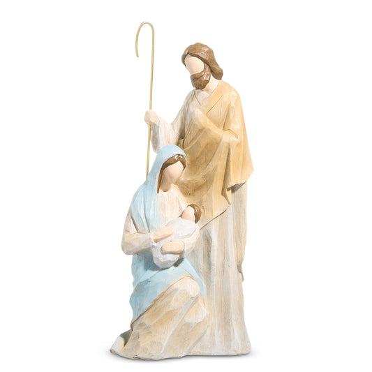 Statue of a woman holding a child on a white background
