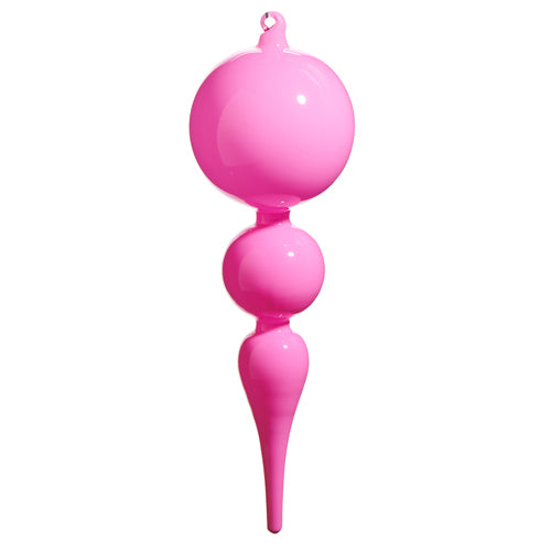 Pink Christmas ornament with a teardrop design on a white background