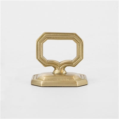 Gold decorative object on a white background