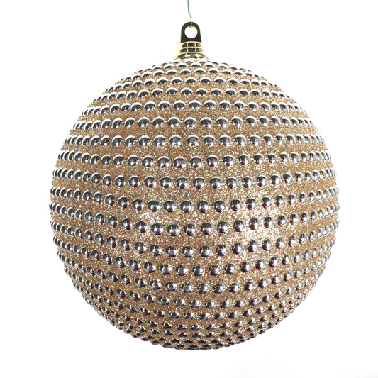 Decorative ball with metallic bead design on a white background