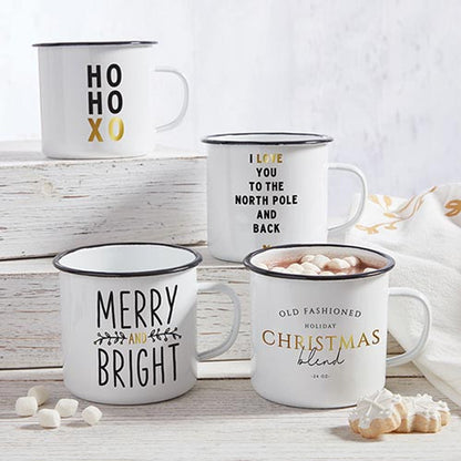 Set of white mugs with black text on a wooden surface with decorative items.