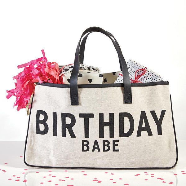 Bag with 'Birthday Babe' text and pink confetti on a white background