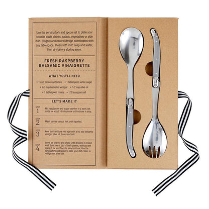 Spoon and fork set in a cardboard box with recipe card on a white background