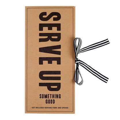 Kraft paper packaging with 'Serve Up Something Good' text and a black and white ribbon.