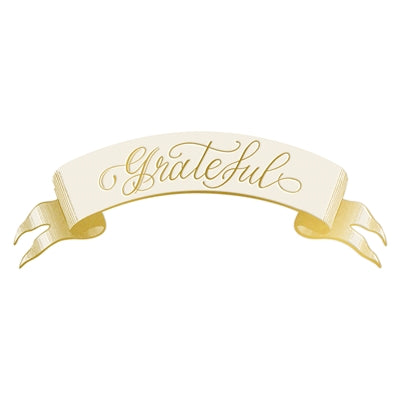 Decorative paper  card accent shaped as a ribbon with 'Grateful' text on a white background