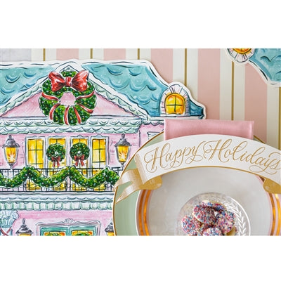 Decorative plate with 'Happy Holidays' text and a Christmas-themed house in the background