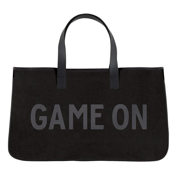 Black tote bag with 'GAME ON' text on a white background