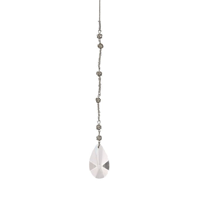 Glass drop ornament with a teardrop-shaped crystal pendant on a white background