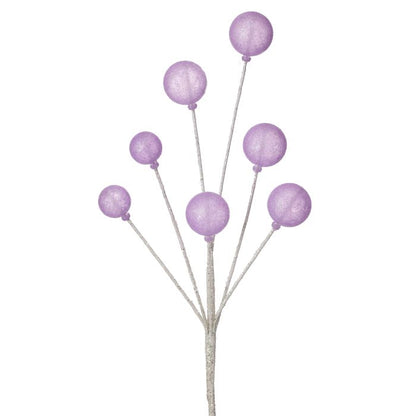 Decorative branch with purple spherical ornaments on a white background