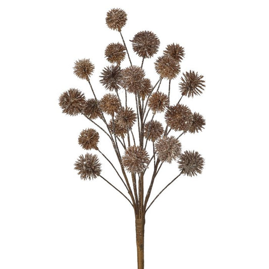 Artificial flower branch with brown spherical flowers on a white background