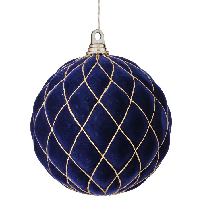 Blue velvet ornament with gold stitching on a white background