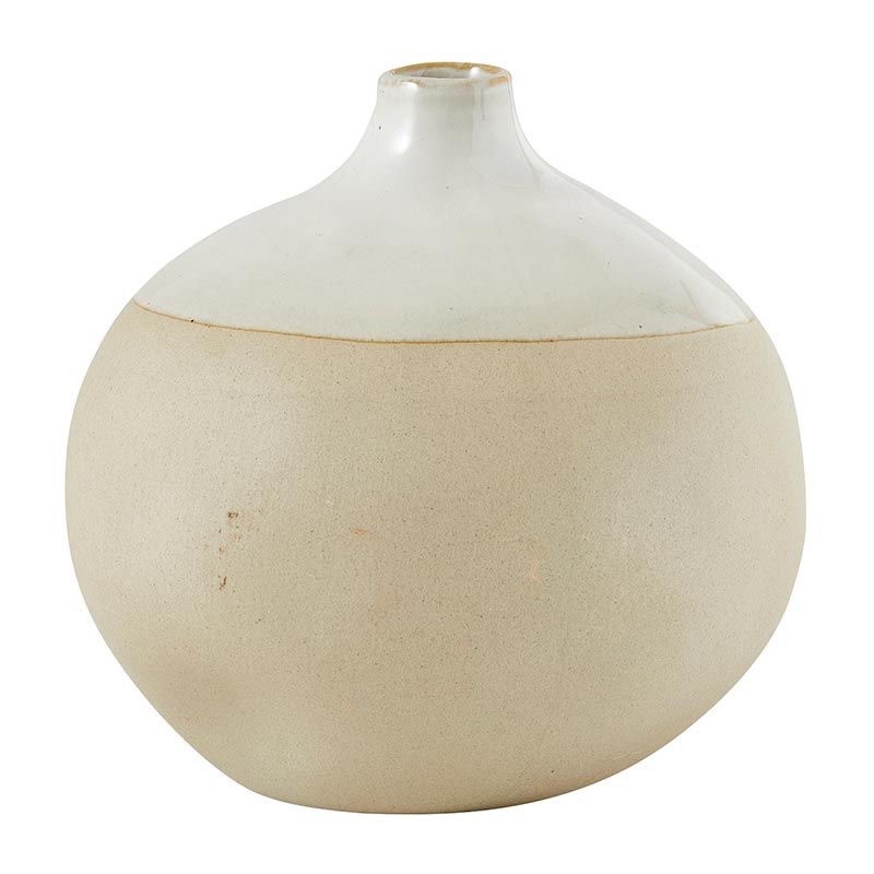 White ceramic vase with a textured surface on a white background