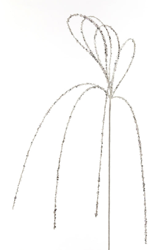 A silver glitter sequin drop spray nozzle.