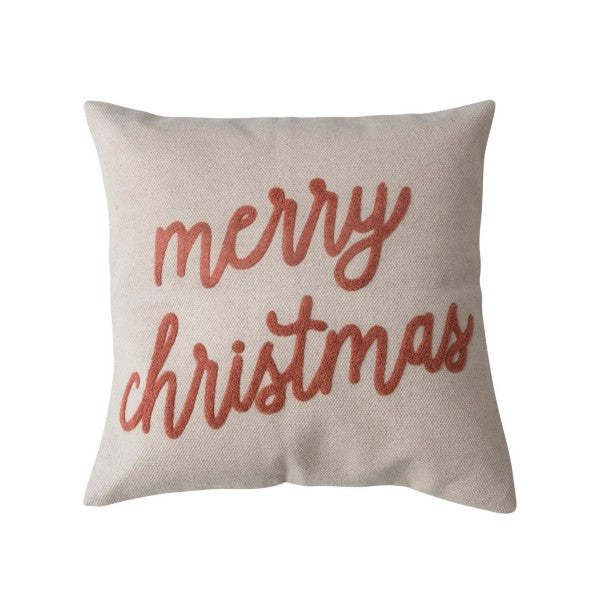 Cream pillow with sienna writing. Merry Christmas written in sienna cursive. 